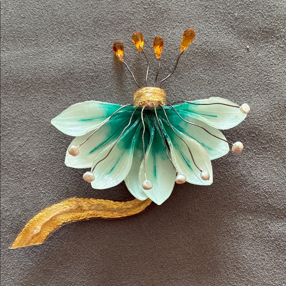 Elegant Floral Brooch with Gold Accents
